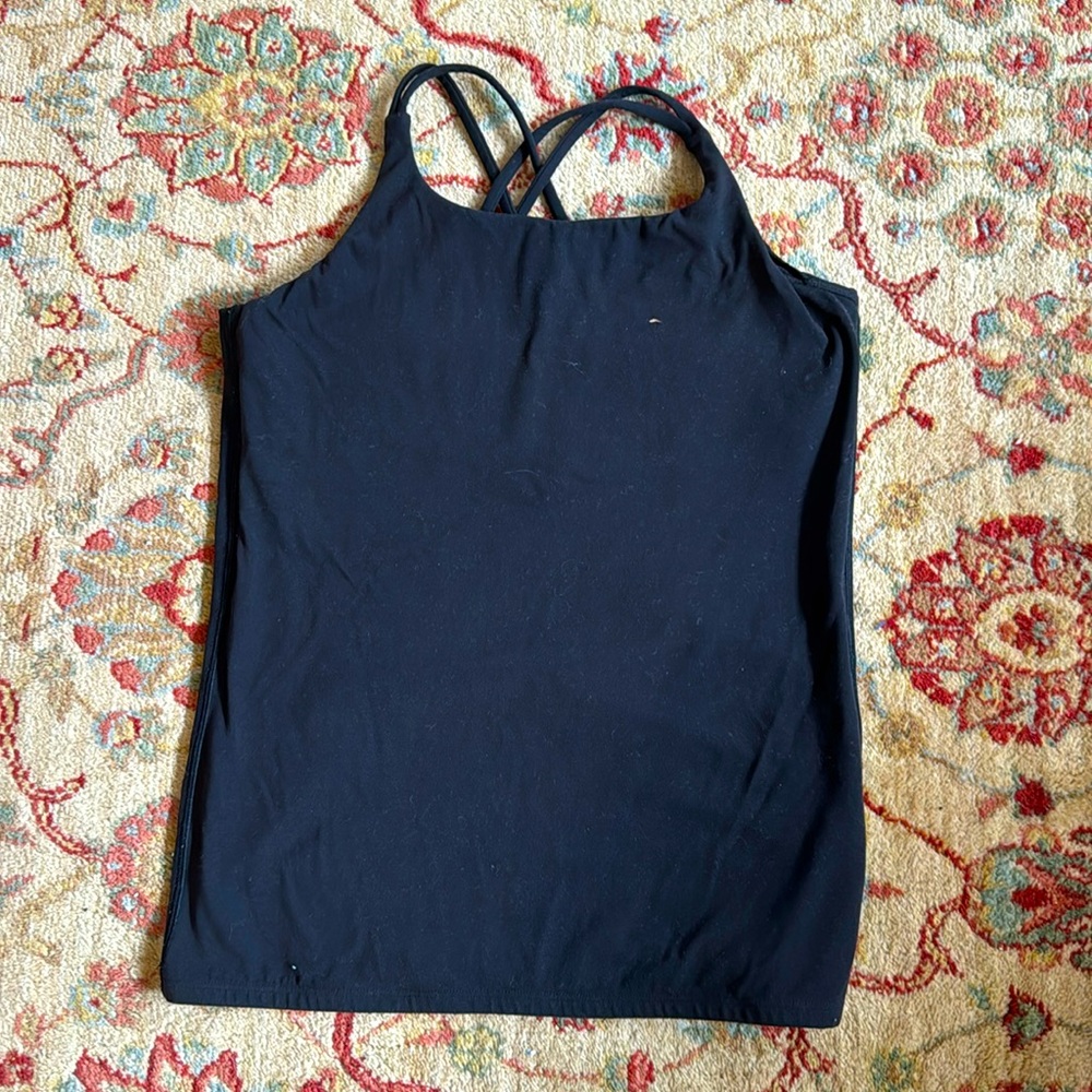 Athleta black athletic tank. Fits S-M. See measurements Excellent condition.